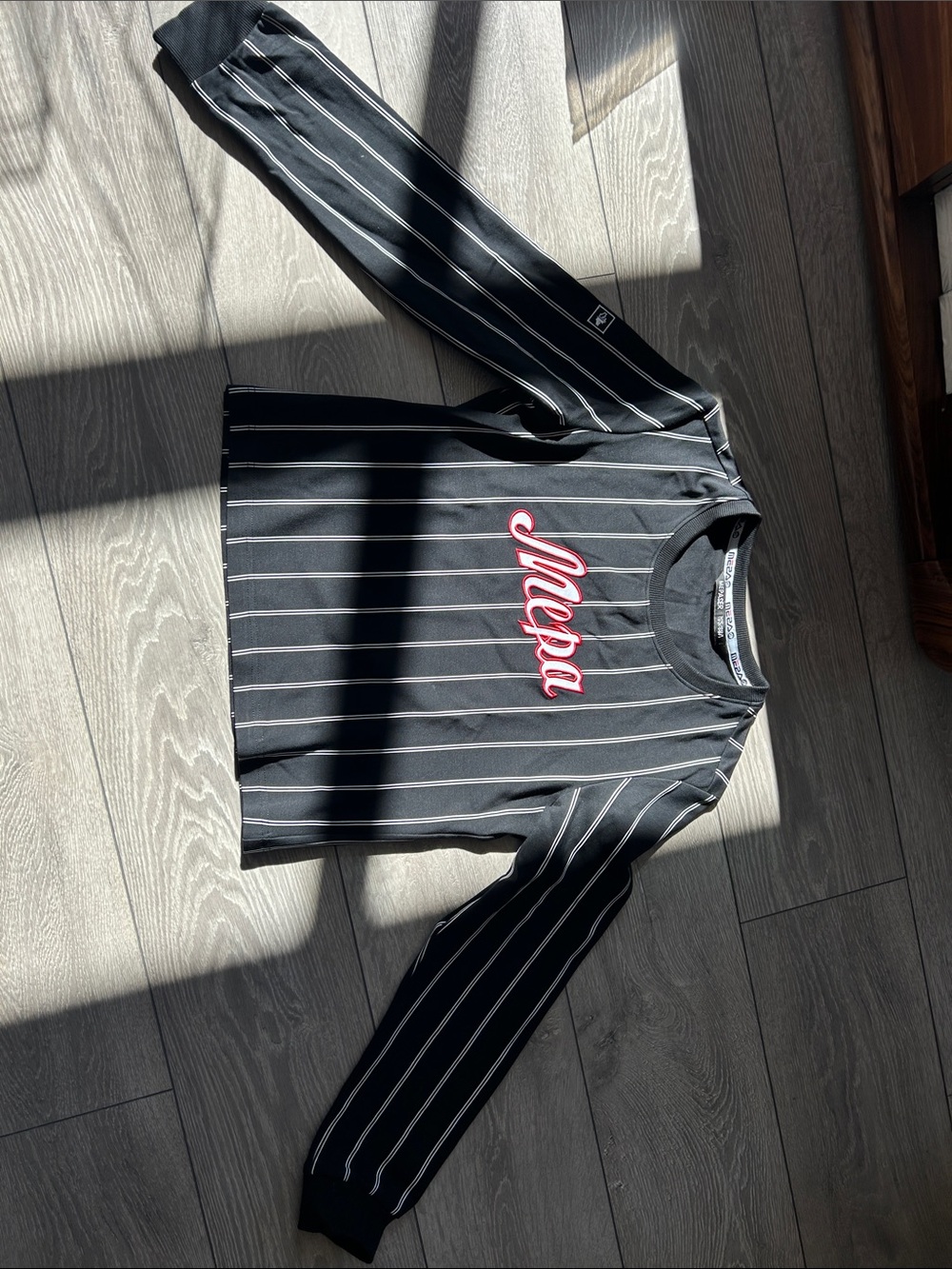 mecca Black Pinstripe Long Sleeve Top with Red Logo